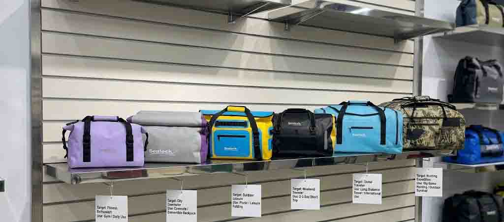 Waterproof duffel retail assortment arranged by shopper type rather than by capacity ladder